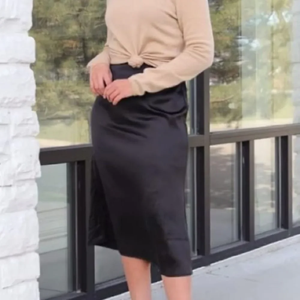 Black satin midi skirt